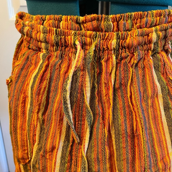 Vertical striped, flow pants in orange and blue/green - Picture 3 of 5